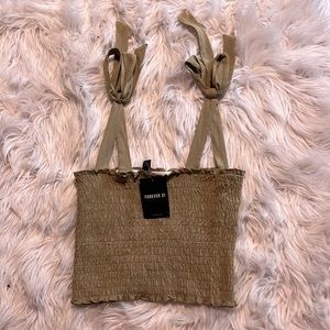 Forever 21 new green tank top with bow/tie straps. Size small